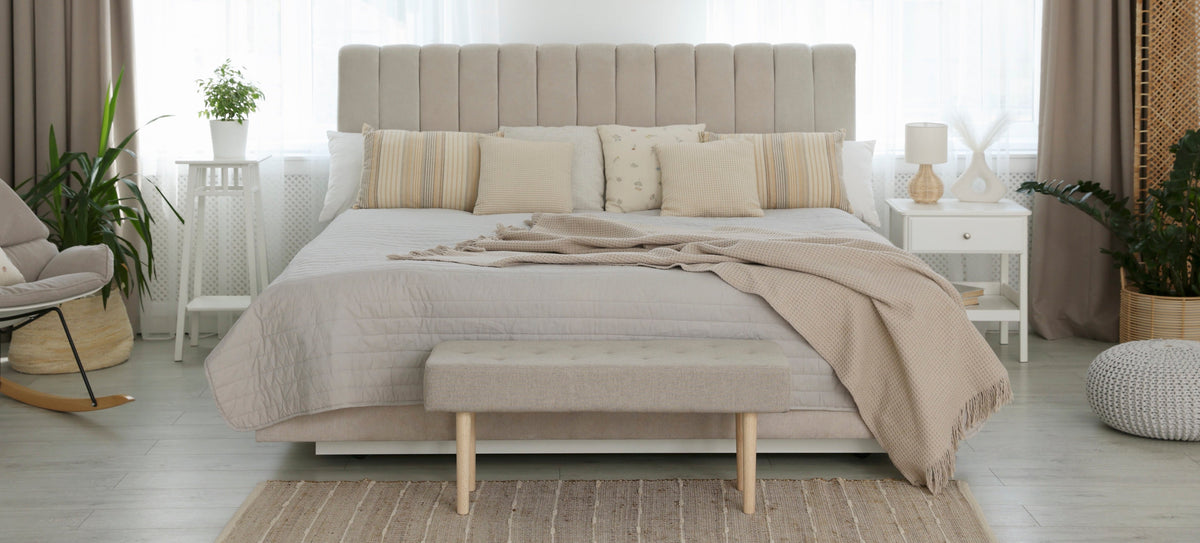 Bedroom with a Charleston Mattress and OZI Sleep tracker under the sheet